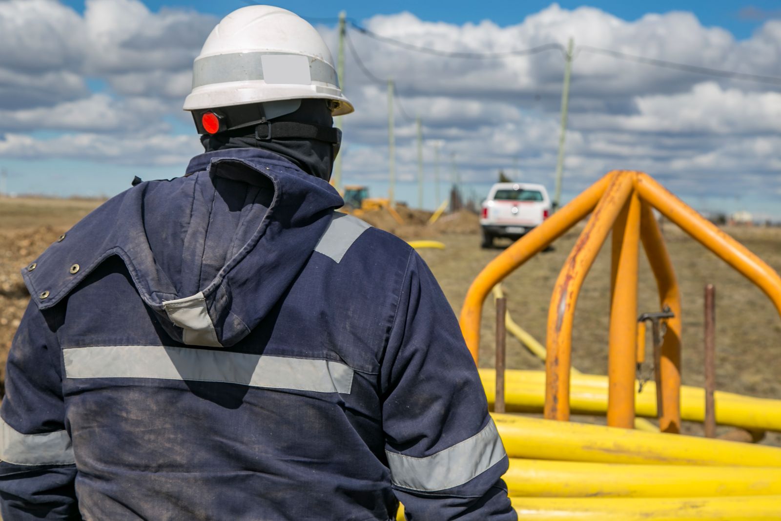 Crew member overseeing work on a Texas pipeline site